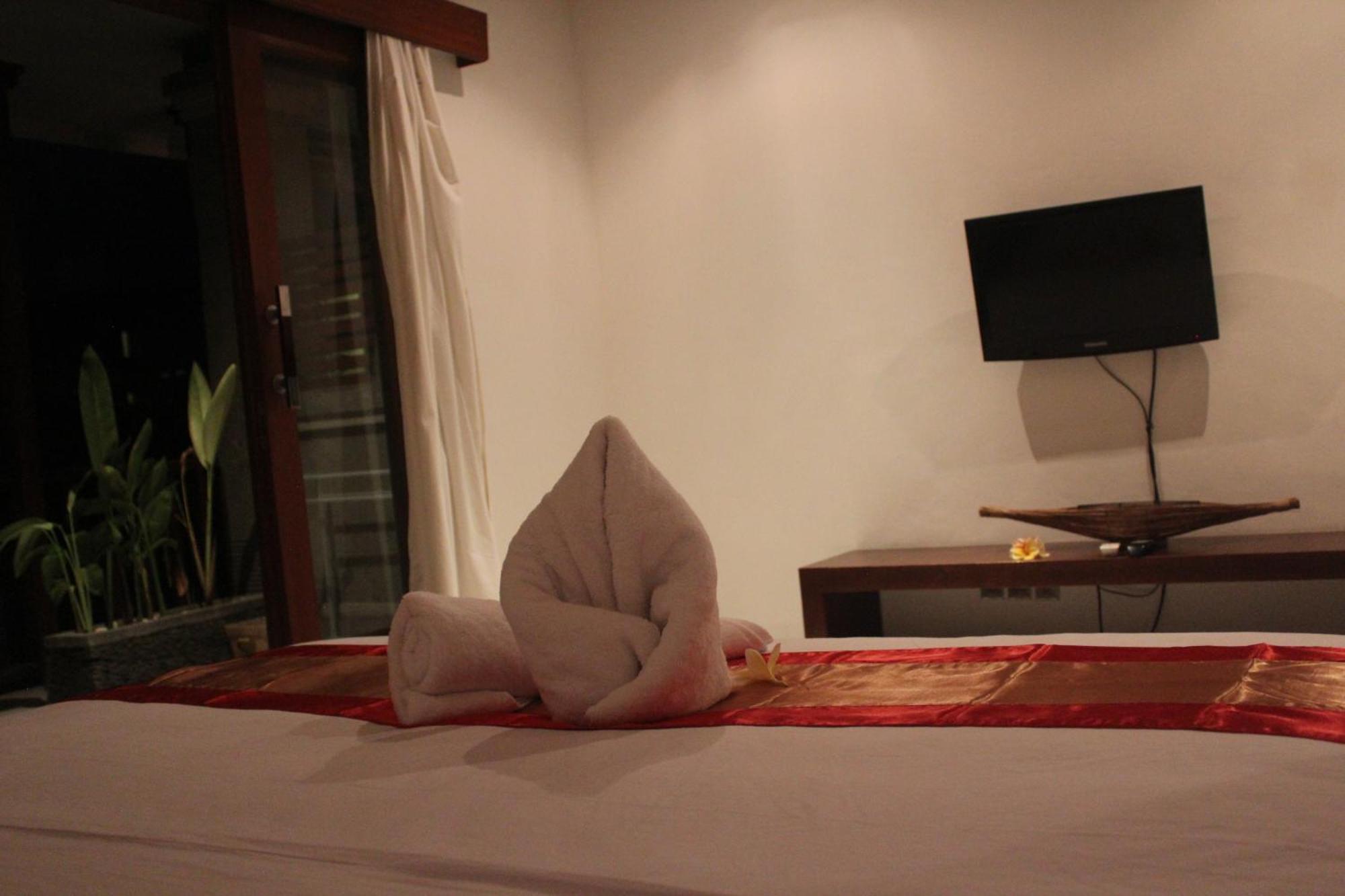 Letos Kubu Homestay Кута Номер фото